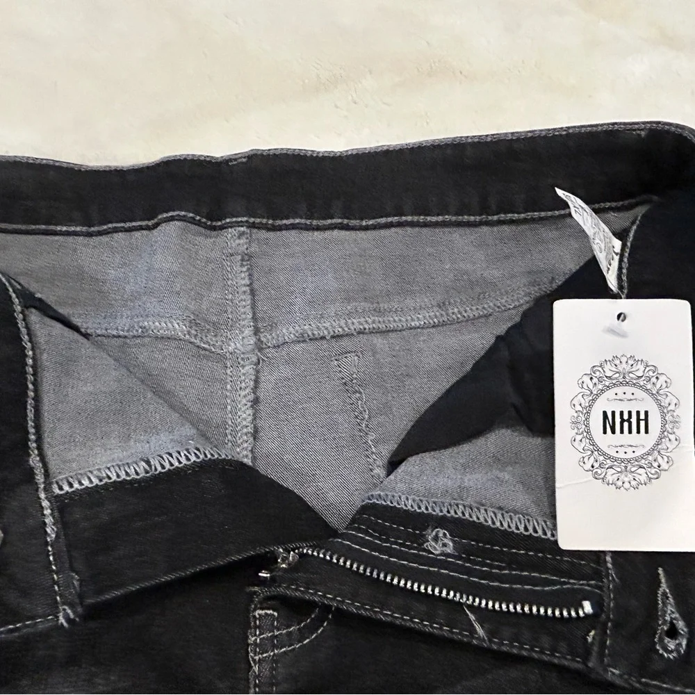 Jeans distressed denim shorts. NWT XL. Folded cuff. Black denim.